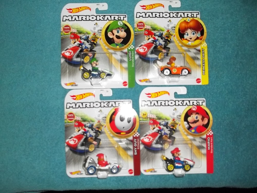 4 Hot Wheels MARIOKART diecast toys