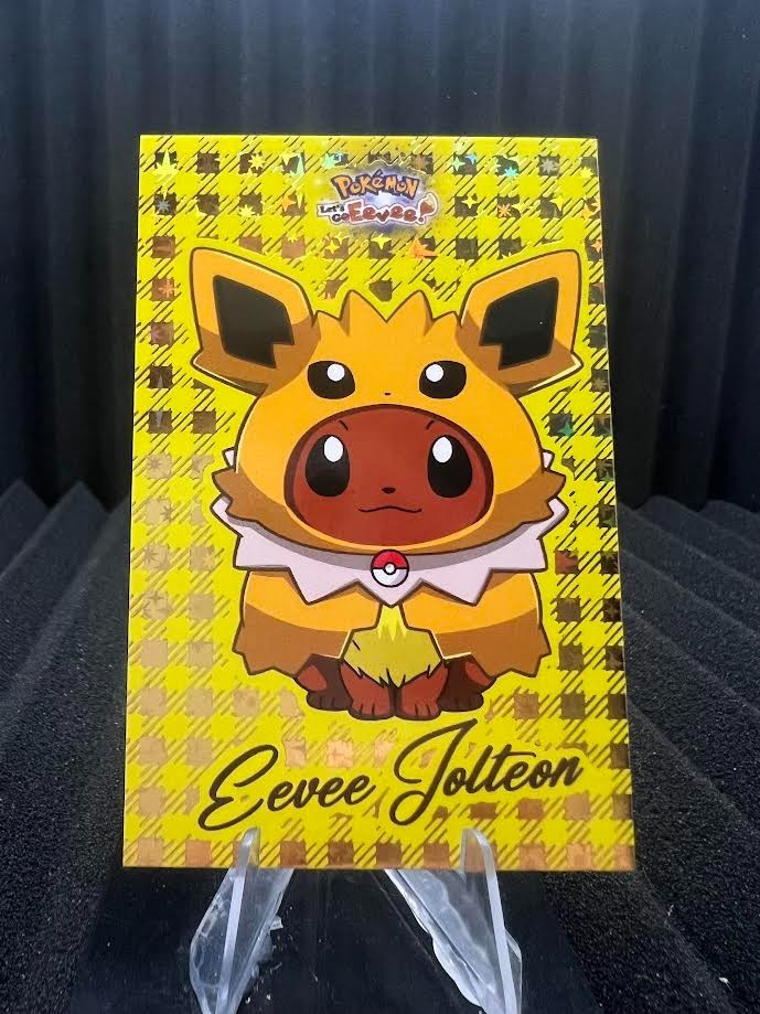 Eevee Jolteon Poncho - Gold Box Hit Holo - Let's Go Eevee Database- Pokemon Card