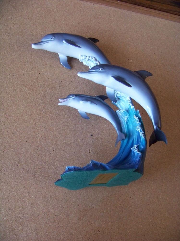 The Danbury Mint Riding the Wave Dolphins figurine statue dolphin Mike Atkinson