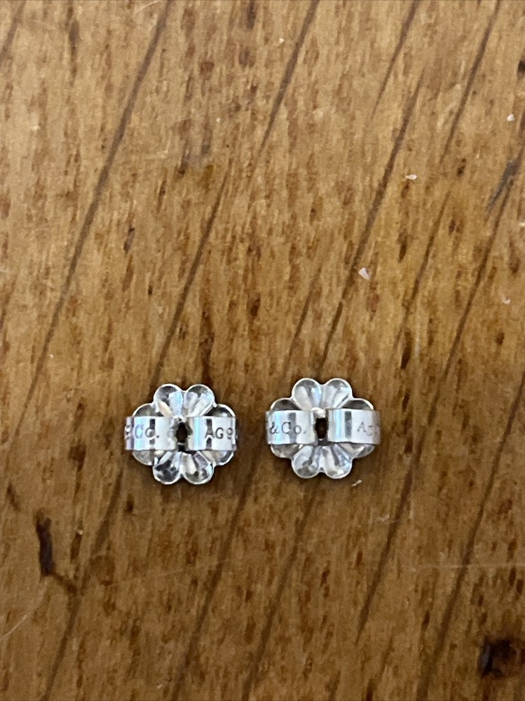 TIFFANY & CO. PAIR OF STERLING SILVER EARRING BACKS FOR STUD EARRINGS