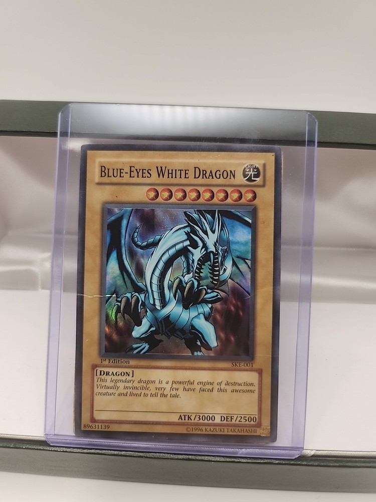 Yugioh! (2)  Blue-Eyes White Dragon SKE-001 Super Rare 1st Edition LP