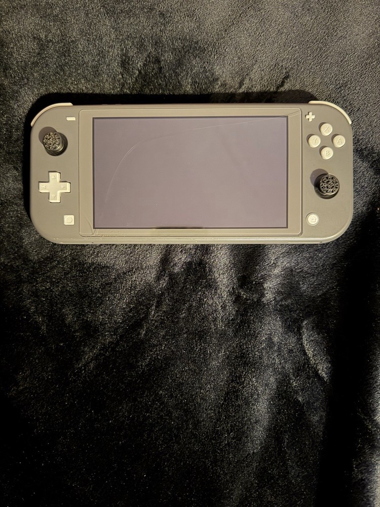 Nintendo Switch Lite With Mario Golf Super Rush, Mortal Combat, And Contra Games