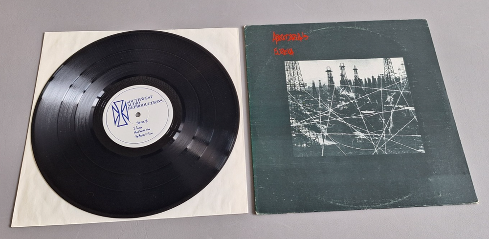 FOR AGAINST dark green sleeve Vinyl LP Eureka (1986 Southwest Audio Records USA)
