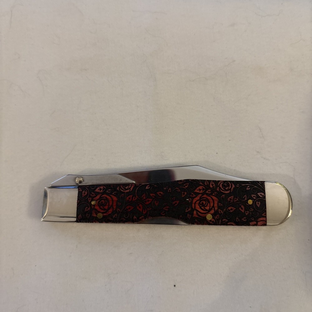 DISC. CASE XX 6111-1/2 SS CHEETAH RED ROSES SFO 1/500 ITEM # CA23119  R