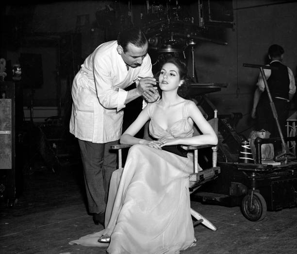 Radio actress Nan Wynn being made up for participation in a film 1940s Photo 1