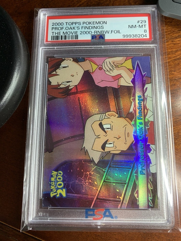 Topps Pokemon the Movie 2000 #29 Professor Oaks Finding RAINBOW FOIL PSA 8 NM-MT