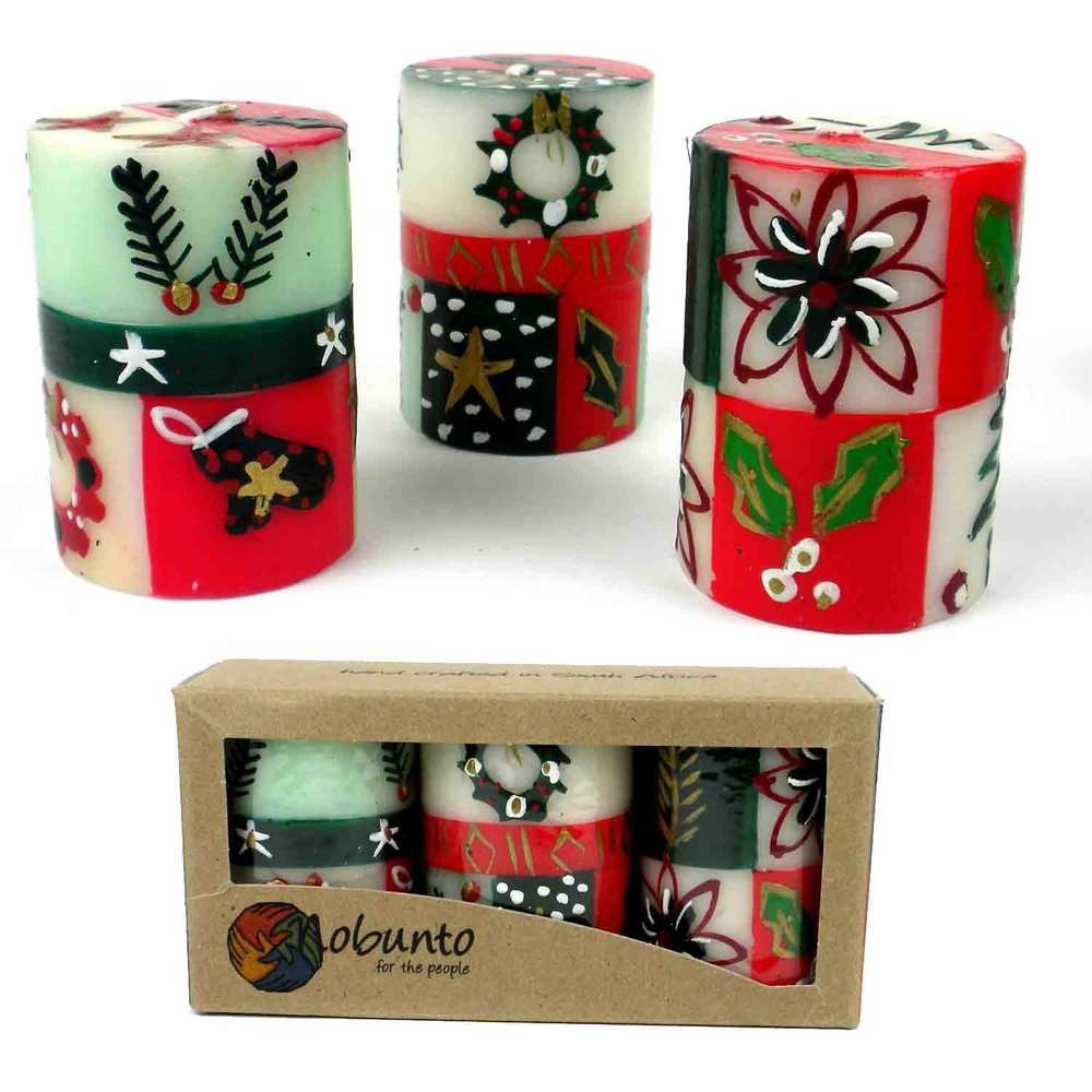 Handmade Christmas votive candles with Ukhisimui design in multi-color set