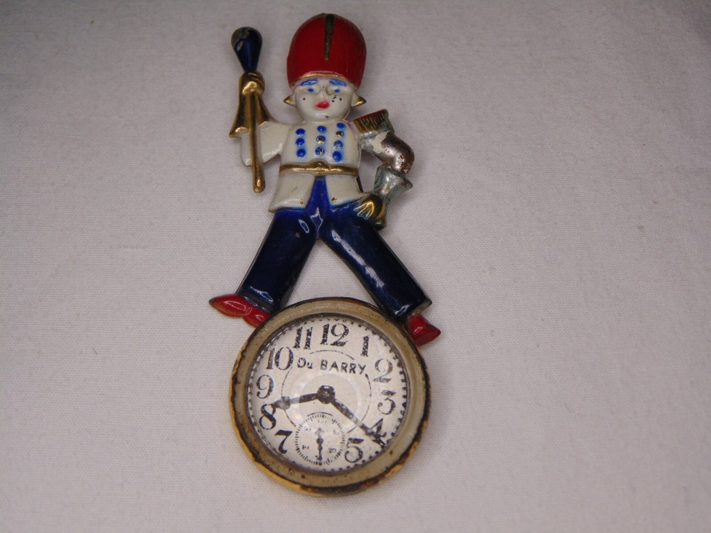 antique Du Barry signed enamel marching band leader jelly belly clock brooch