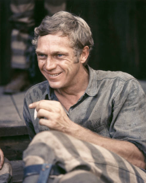 Steve McQueen smokes a cigarette during filming the 1966 western N- Old Photo