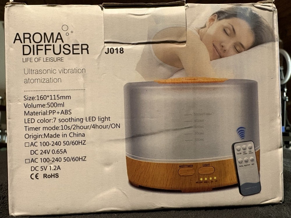 New In Box Aroma Diffuser: Humidification, Aromatherapy, Purify Air, Color Lamp