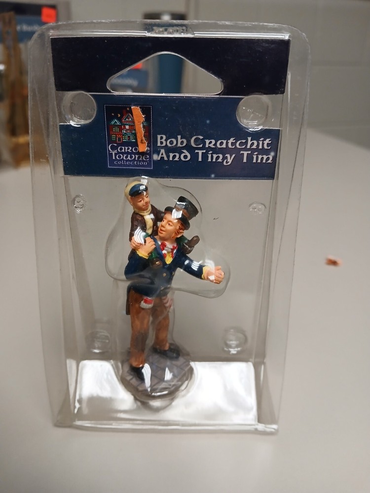 Carole Towne as Bob Cratchit with Tiny Tim in Dickens Classic