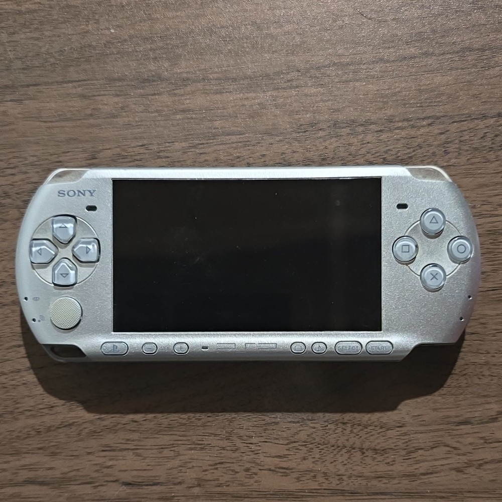 Sony PSP-3000 Silver Handheld Console Wi-Fi with Monster Hunter Freedom Unite