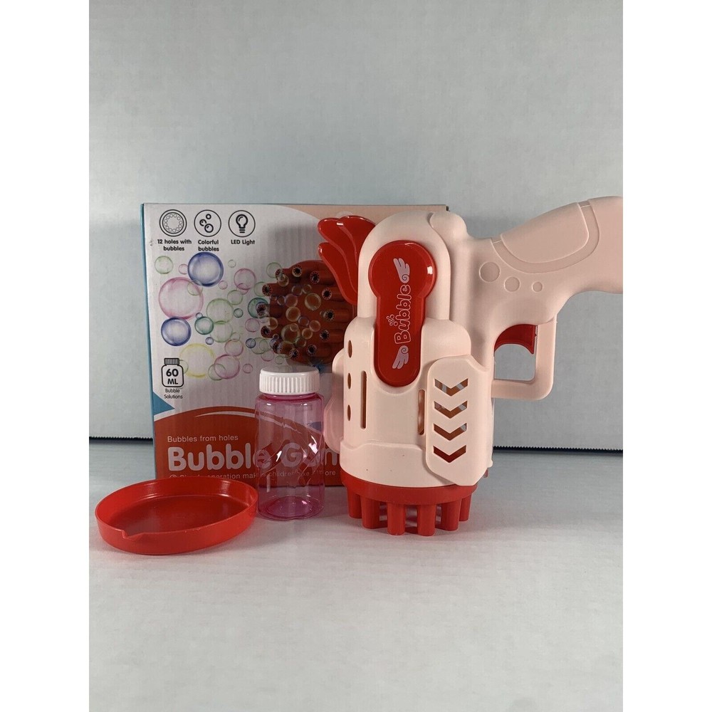 RED bubble gun - 12 holes with LED light- New in box AA Batteries NOT include