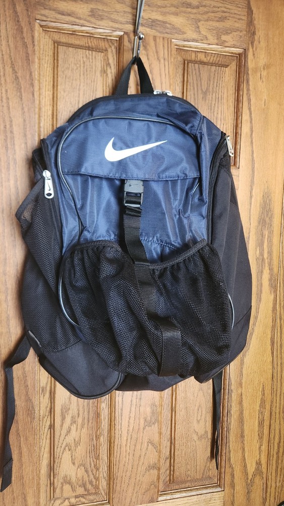 Nike Backpack with Mesh Front Pocket and Multiple Zippered Compartments