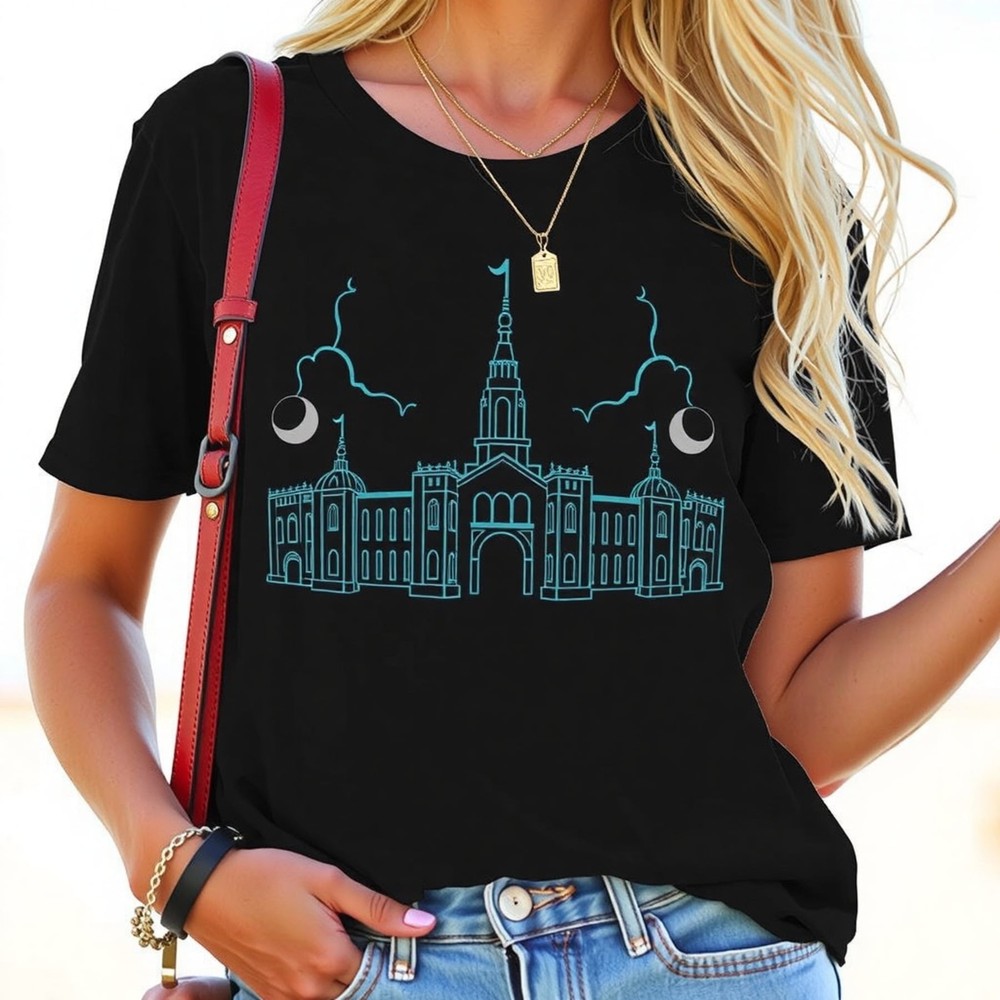 Stylish Black Graphic T-Shirt with Teal Building & Moons Casual Ev