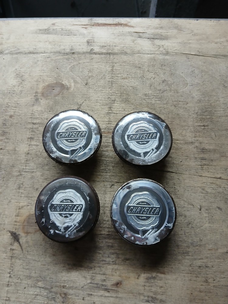 Genuine set of Chrysler Crossfire PT Cruiser 300 Alloy wheel trims centre caps.