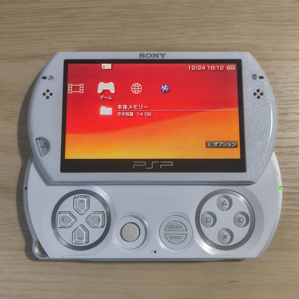 PSP Go PSP-N1000 Pearl White | Tested | AC Adapter Manual | M2 16GB