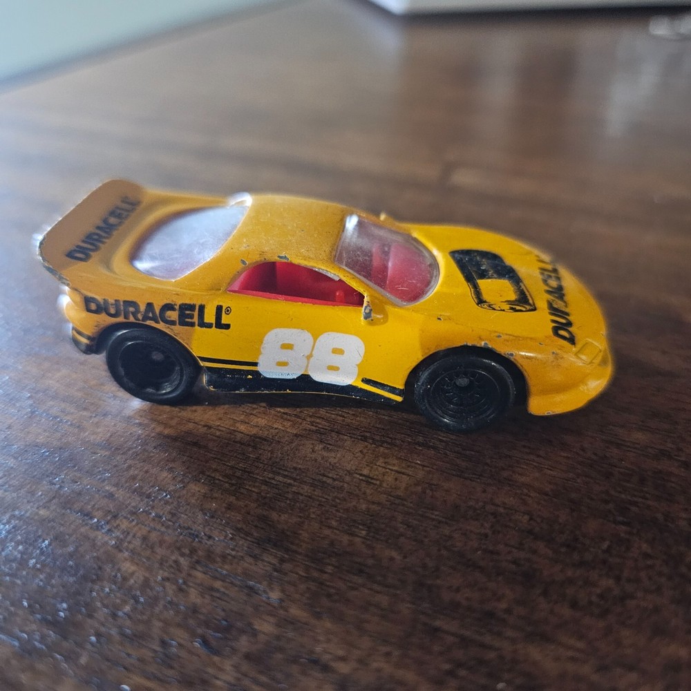 1993 Hot Wheels Duracell #88 Race Car 1:64 Diecast Yellow Orange Vintage Mattel