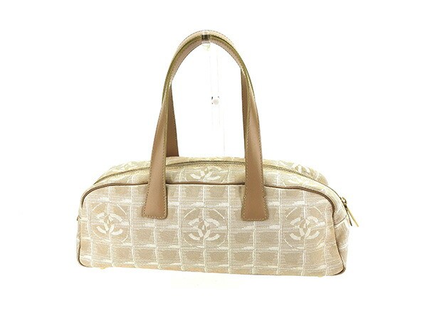 CHANEL Mini Boston Bag in Beige Gold Nylon Jacquard Neutral Travel Line