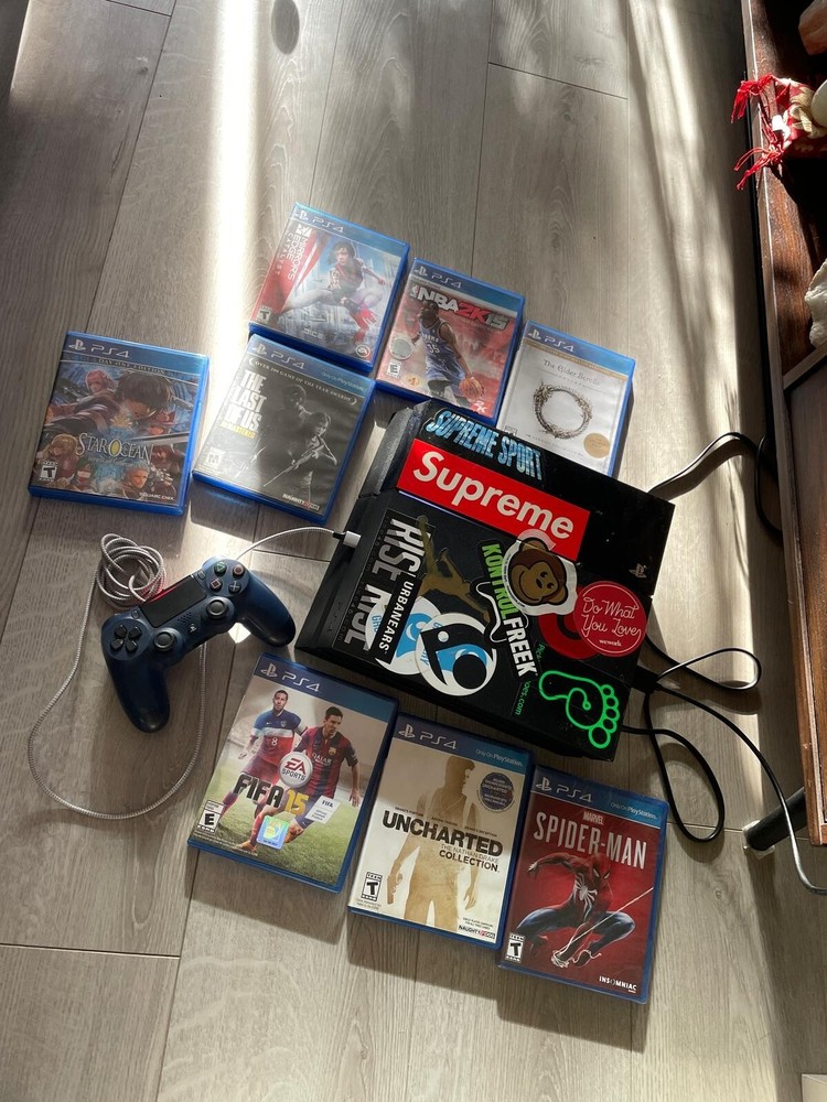 PS4 Bundle 2TB with 8 Games Controller and FightStick Excellent Condition