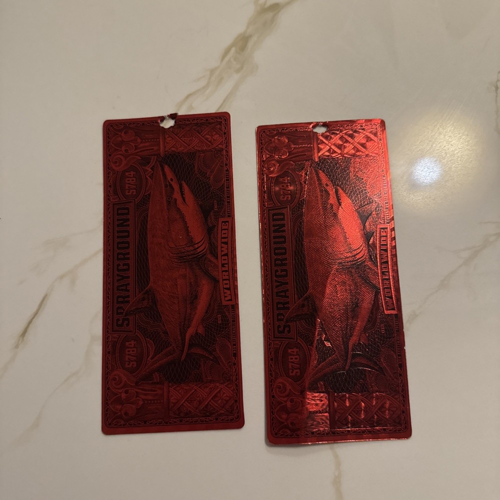 sprayground tags!!!!!! And One of them is broken