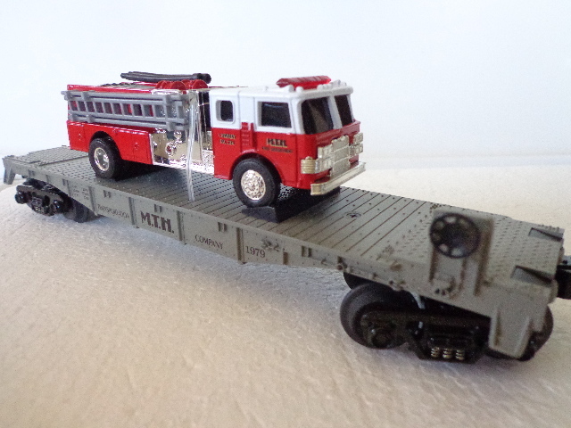 MTH 30-7629 Transportation Company Flatcar With ERTL Fire Truck