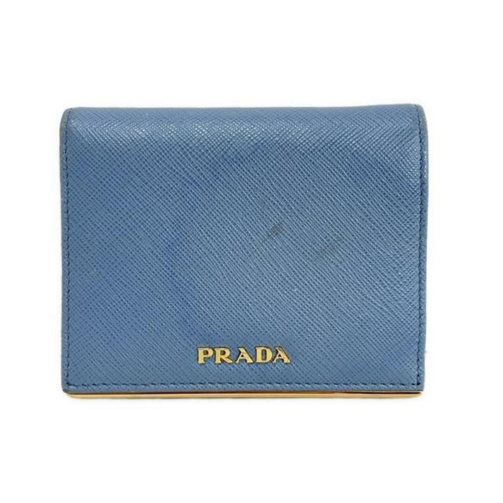 Prada bifold wallet in light blue and gold leather 1MV204