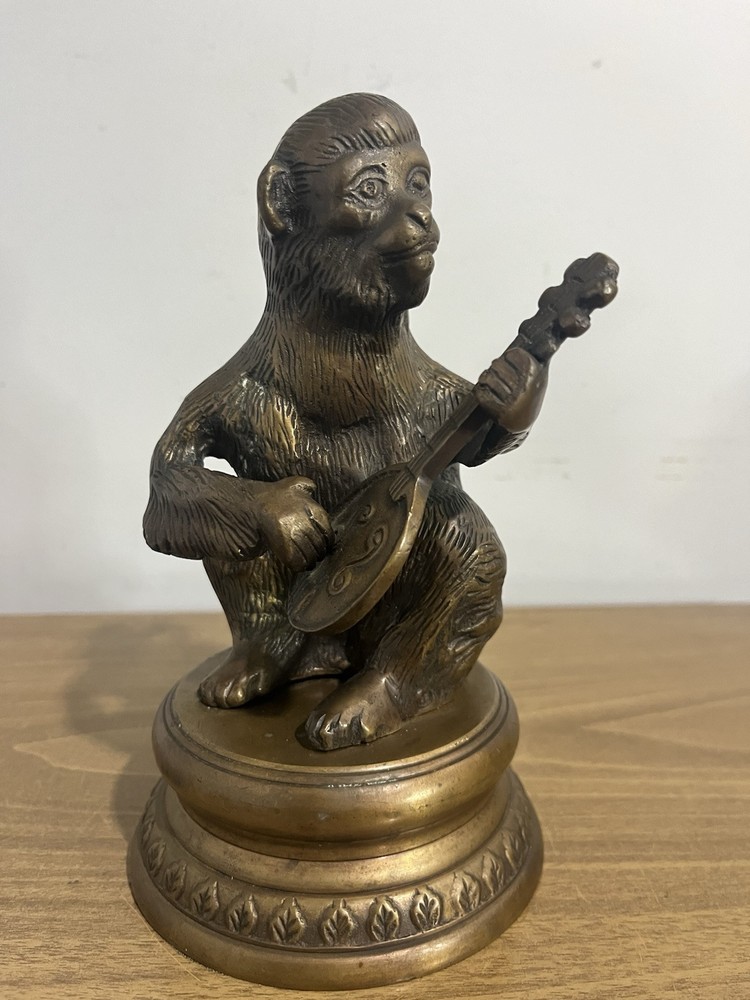 Vintage solid brass monkey playing mandolin on pedestal figurine