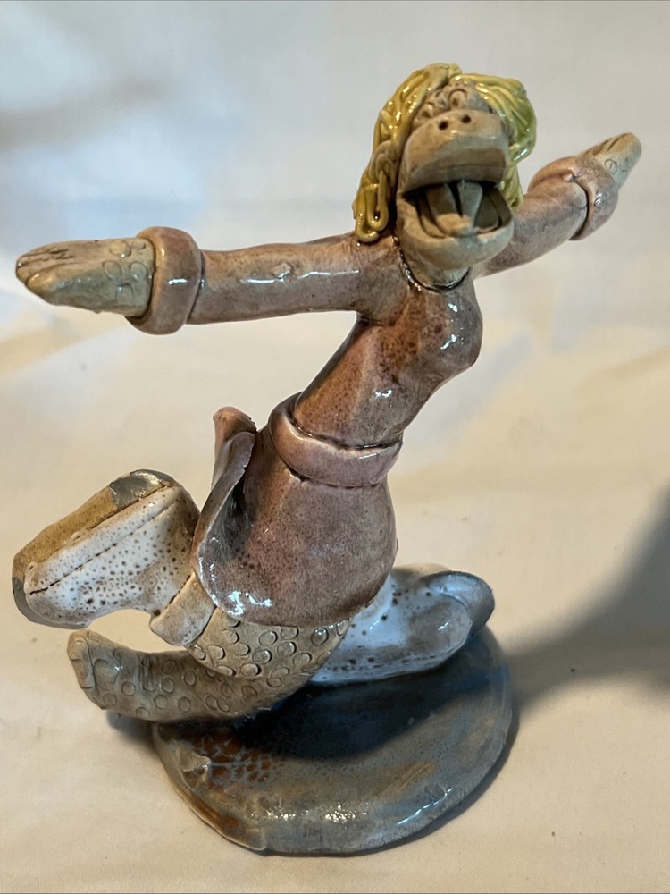 Funky Lizard Ice Skating Pottery Sculpture with Big Eyes and Blonde Spaghetti Hair