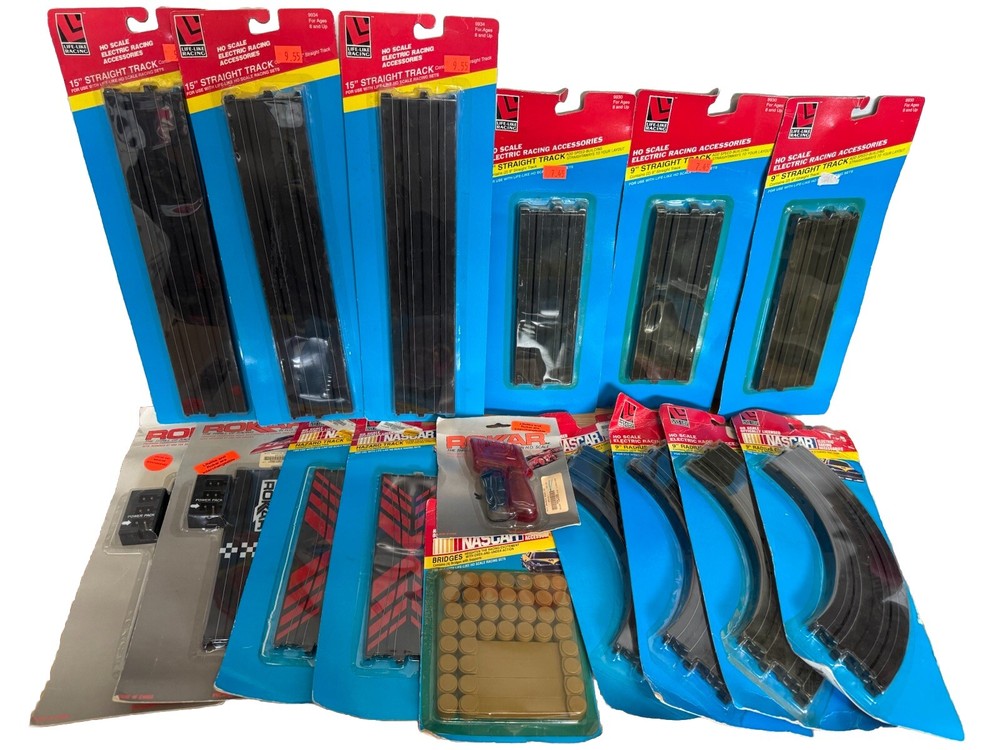 LIFE-LIKE,  HO SLOT CAR TRACK LOT IN ORIGINAL PACKAGING.