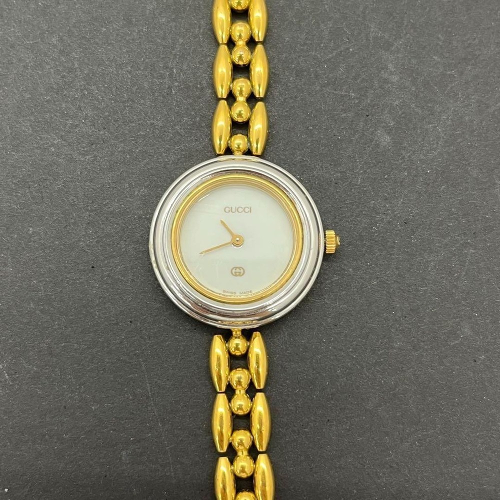Gucci 11/12 Gold Bezel Bangle Watch with Blue Dial KI250320132 Battery Powered