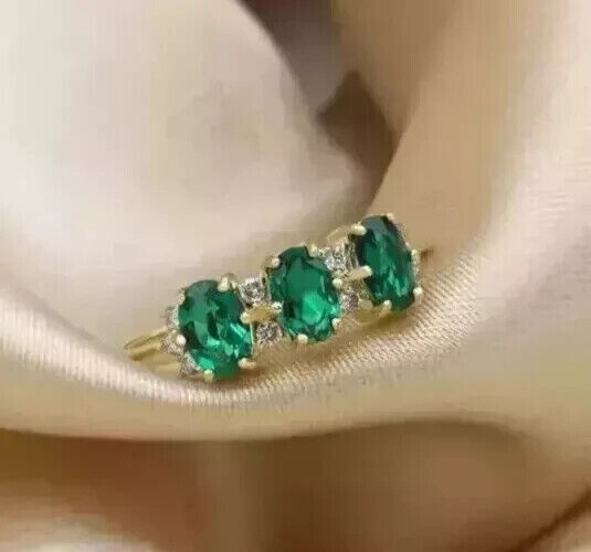 3Ct Oval Cut Emerald Simulated 3-Stone Wedding Band in 14K Gold Plated