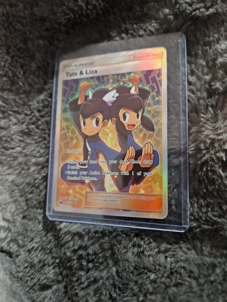 Tate & Liza (Full Art) 166/168 Sm-Celestial Storm Holo
