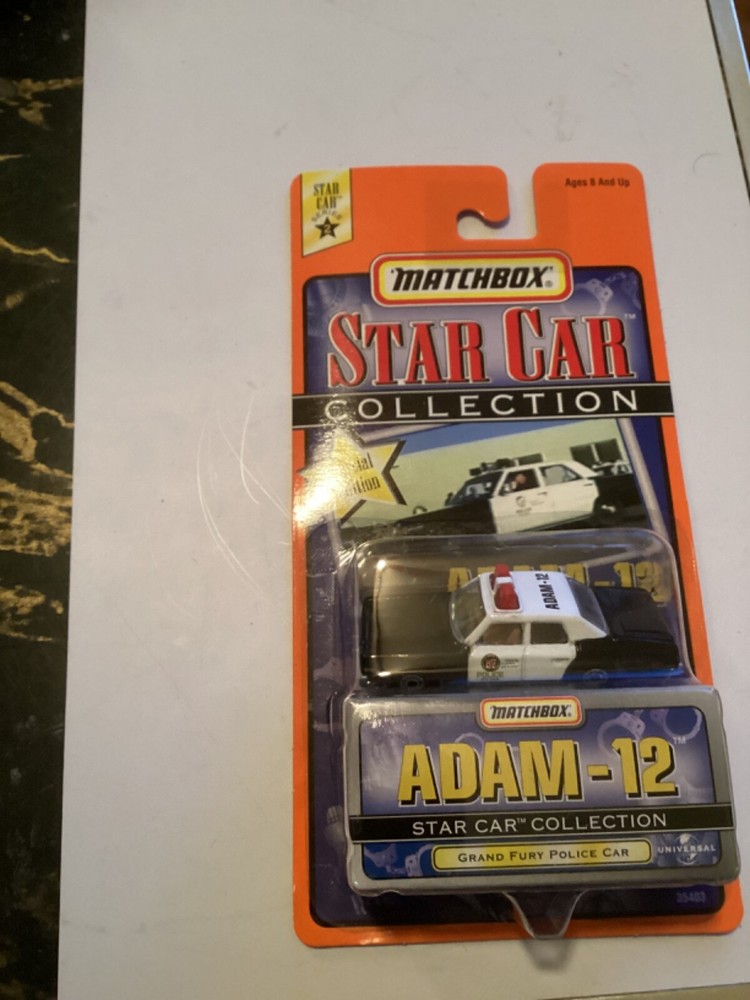 Matchbox Star Car ADAM - 12 GRAND FURY POLICE CAR, NEW 1998, Very Popular