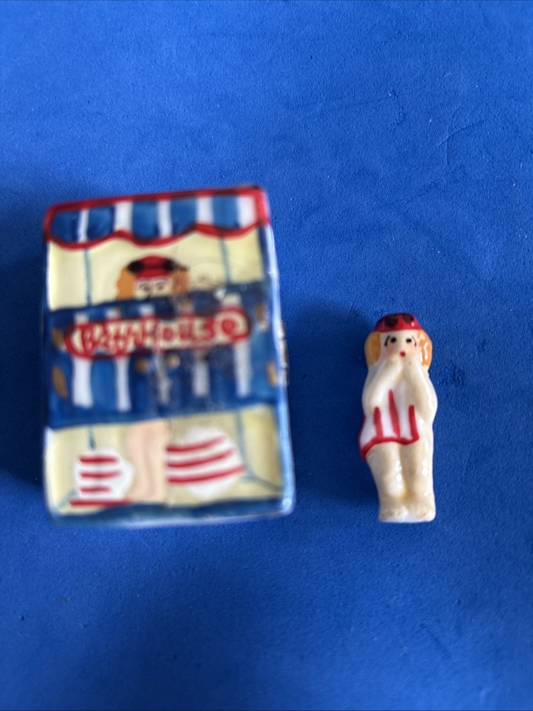 Vintage hinged enamel jewelry box shaped like a beach house with doll charm