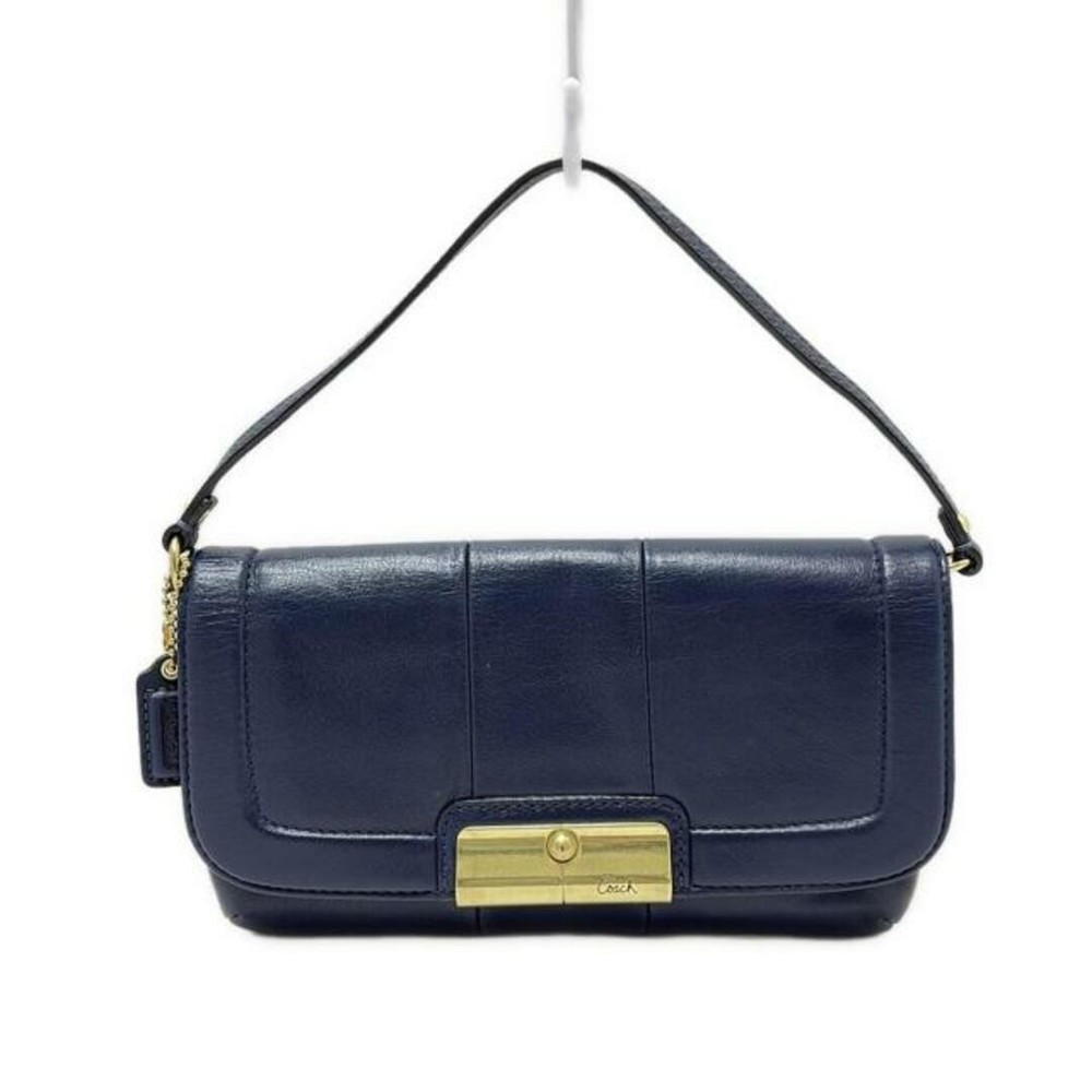 COACH navy blue leather mini handbag in excellent condition