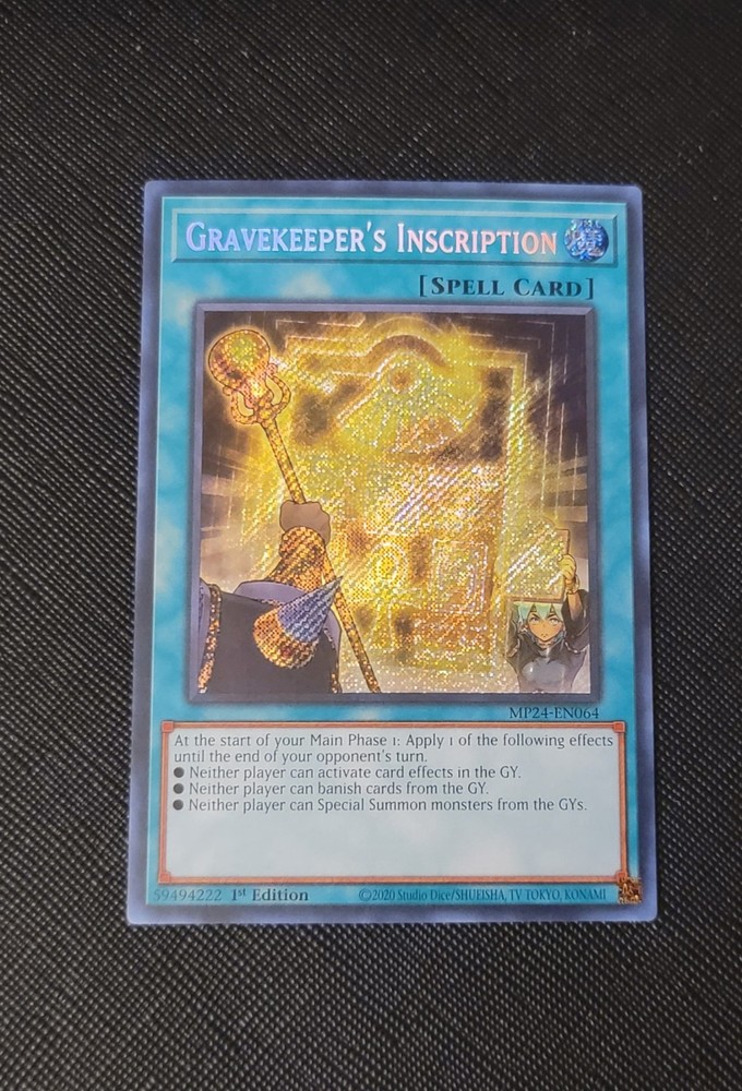 YGO Gravekeeper's Inscription MISPRINT Secret Rare NM 2024 Mega Tin MP24-EN064