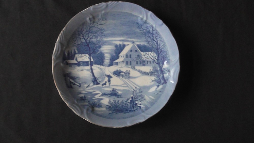 Currier & Ives blue and white winter scene plate titled The Homestead in Winter