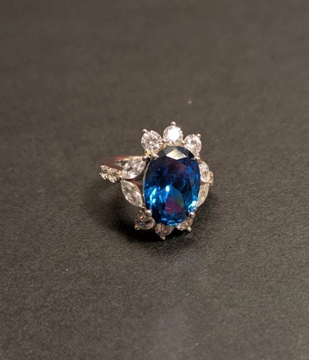 Blue Oval Gemstone With White Gemstone Petals Silver Band Ring Never Worn