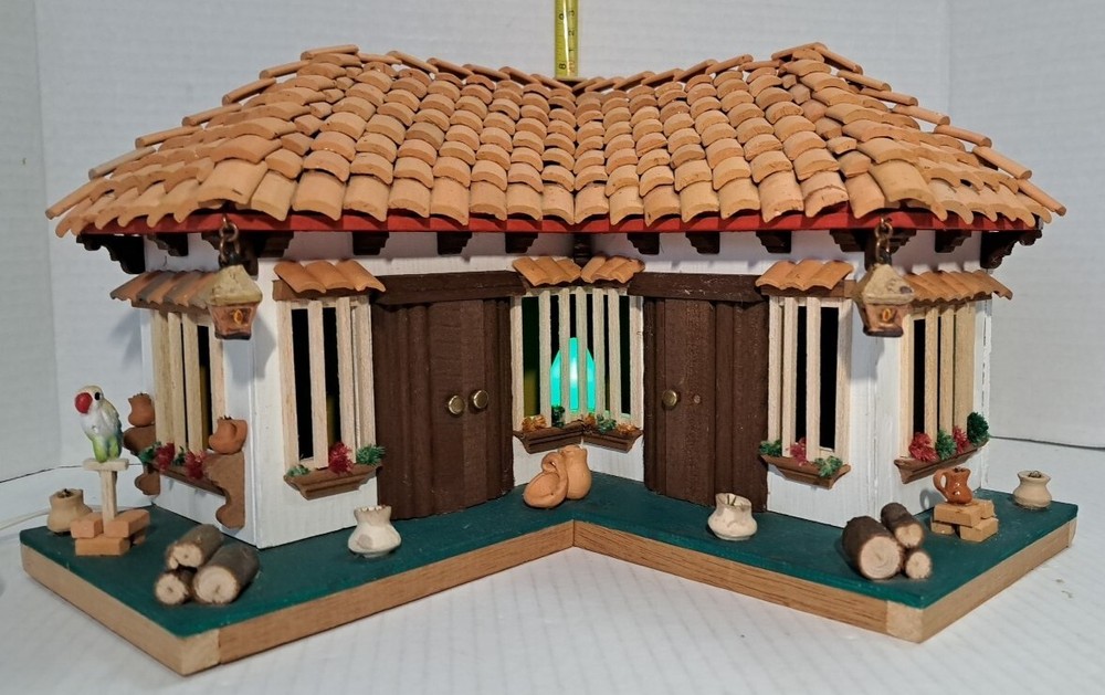 Southwestern Mission Style L-Shaped Wood Wall Art with Terracotta Roof and Warm Lighting