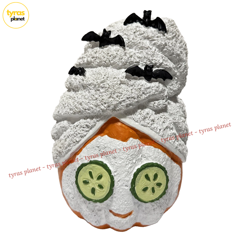 Spooky pumpkin head spa towel with bat design for facials  