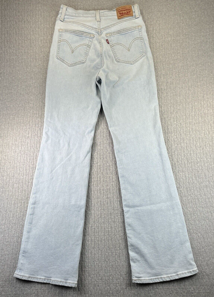 Levi’s RibCage Boot Women’s (29) button fly faded, light wash denim blue jeans