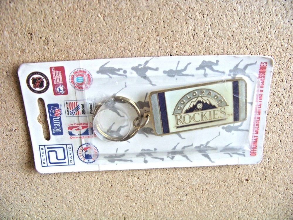 Colorado Rockies old logo metal key ring MLB light yellowing
