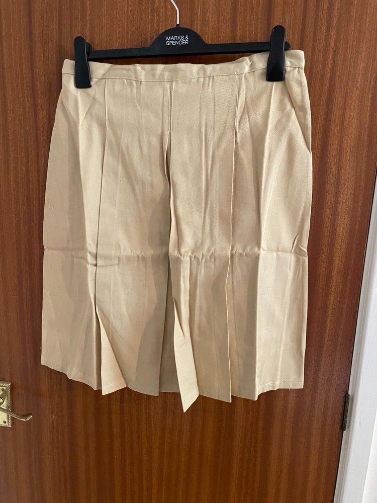 Women's pleated sand-colored skirt size 12 midi length
