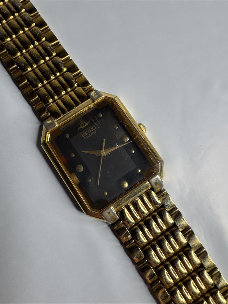 VTG Seiko Men’s Watch V701-5J50 Goldtone Black Dial 25mm Tank New Battery
