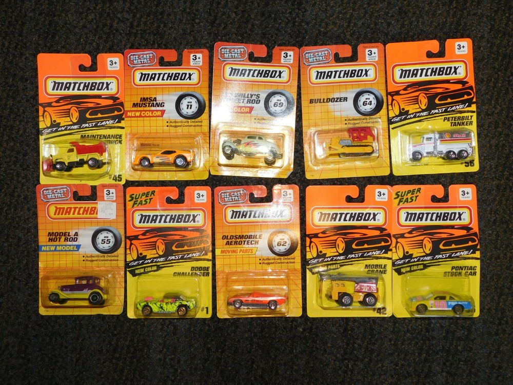 VINTAGE TOY LOT of  10  1993 (9) , 1990  MATCHBOX CARS TRUCKS  NEW IN PACKAGE