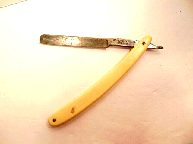 old straight razor labeled 