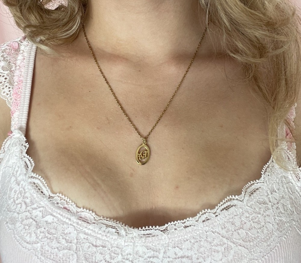 vintage christian dior gold plated logo pendant necklace