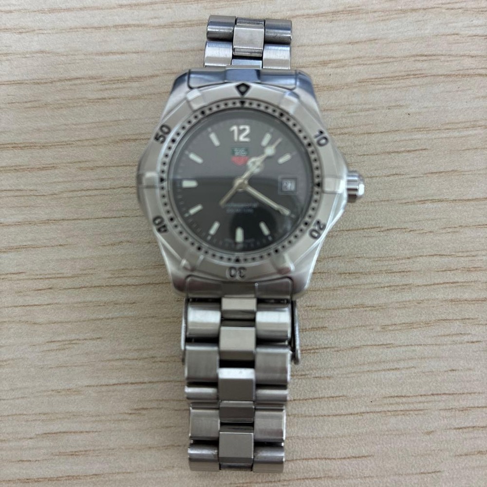 TAG Heuer Quartz Wristwatch Stainless Steel Black Dial 100m Water Resistant