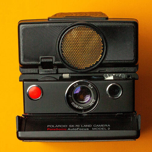 Polaroid SX-70 Land Camera Polasonic Autofocus in Sleek Black Design